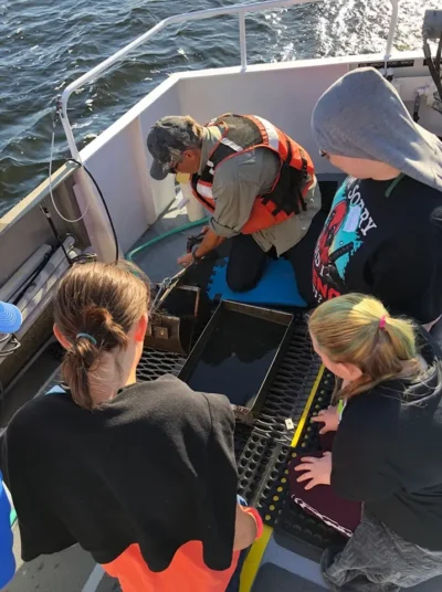 a group of people on a boat